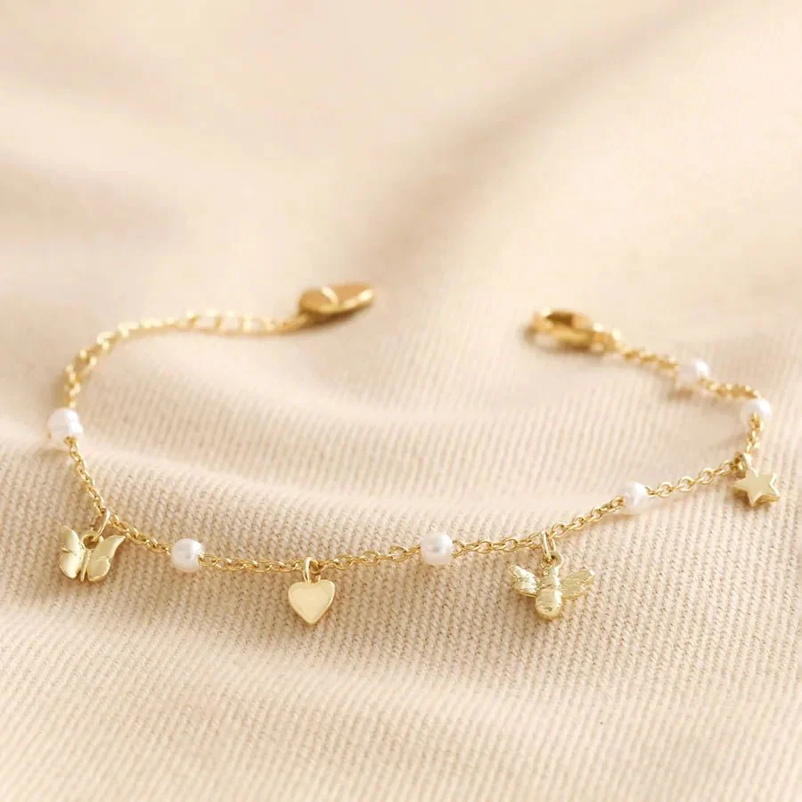 Lisa Angel Bee, Pearl, Butterfly and Heart Charm Bracelet in Gold